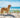 Dog on sandy beach with sea