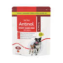 White background with a packet of Antinol Joint Care Pro for Dogs, the packet has red and burgundy ascents with a Border Collie dog and a Jack Russel terrier pictured. Additional text on the packet states '100% Natural, Supports Joint Health and Mobility, For healthy skin and a shiny coat, Supports natural anti-inflammatory processes, Free from powders and fillers'.