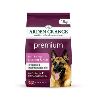 A 12kg bag of Arden Grange Premium dog food, rich in fresh chicken & rice. The packaging is dark purple with white and pink text, featuring a photo of a German Shepherd on the front.