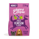 White background with a purple bag of Edgard & Cooper Adult Dog Dry Food Venison and Duck pictured. On the packet is an illustrated French Bulldog and Cocker Spaniel. Text on the pack reads, 'Edgard & Cooper.' A silhouette of a deer has text inside 'Fresh Venison & Duck' and 'Grain Free' below.