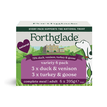 A box of Forthglade Natural Complete Meal Adult wet dog food, variety 6 pack, containing duck, venison, turkey, and goose. The packaging features a white background with green and purple banners, a green landscape illustration, and a white dog.