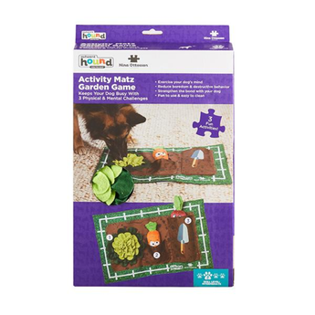 Nina Ottosson Activity Matz Garden Game retail packaging, showing product title, a small preview of the game board, and a dog pictured using the mat on a white background.