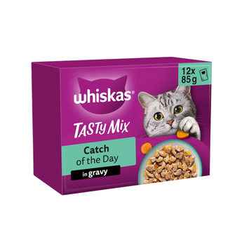 White background with a purple box of Whiskas Catch of the Day, on the box is silver tabby kitten in front of a bowl on food. Text on the pack reads 'Whiskas, 1+, Catch of the Day, in Jelly, 12x85g'