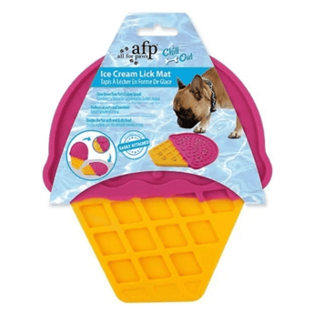 Silicone ice cream shaped lick mat with a pink top with a yellow waffle cone detailed bottom pictured with a blue cardboard sleeve which has a brown dog pictured using the lick mat. Text on packaging says 'Ice Cream Lick Mat' and 'Easily attached'.