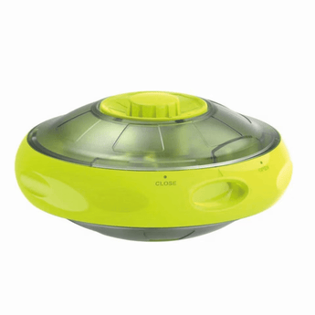 UFO shaped treat dispenser with green central and top parts with main body in grey sat on a white background.