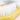 White background with a close up of a small Ancol yellow brush with white bristles for rabbits.