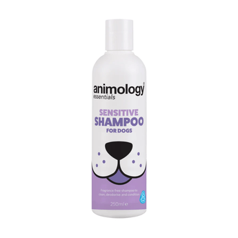 White background with a white and lilac 250ml bottle of Animology Essentials Sensitive Shampoo for Dogs. On the bottle is an illustrated muzzle with white text below 'Fragrance free shampoo to clean, deodorise and condition.'