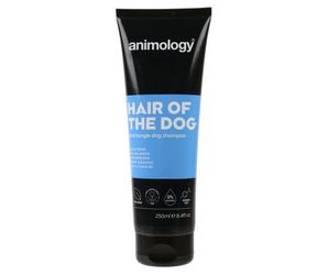 White background with a black and blue bottle of Animology Hair of the Dog Shampoo. On the bottle is white text 'Animology Hair of the Dog, Anti-tangle dog shampoo'.