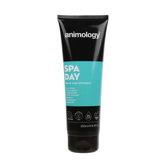 White background with a black and aqua blue bottle of Animology Spa Day Shampoo. On the bottle is white text 'Animology Spa Day, skin & coat dog shampoo'.