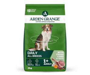 A 2kg bag of Arden Grange Daily All Breeds dog food, featuring a green and white package with a photo of an Collie-type dog and illustrations of fresh lamb and rice.