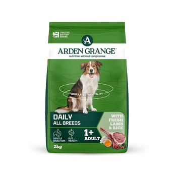 A 2kg bag of Arden Grange Daily All Breeds dog food, featuring a green and white package with a photo of an Collie-type dog and illustrations of fresh lamb and rice.