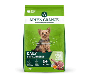 A 2kg bag of Arden Grange, Daily, Small Breeds dog food, formulated for adults. The packaging is bright green with a photo of a Yorkshire Terrier in the center, and displays 'With Fresh Lamb & Rice' along with ingredient icons at the bottom.