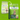 Two Arden Grange dog food packages on a bright green background, demonstrating the recent change in packaging.