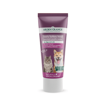 A tube of Arden Grange Tasty Turkey Treat premium poultry paste dog and cat treats, featuring a purple and white design with images of a cat and a dog on the front.