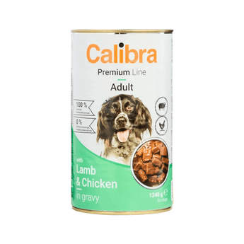A can of Calibra Premium Line Adult dog food, Chicken & Lamb in gravy, 1240g. The can features a white and green label with a picture of a brown dog and a circular inset showing the wet food pieces.