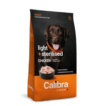 A bag of Calibra Expert+ light + sterilised adult chicken dry dog food, featuring a black and orange package design with a picture of a chocolate Labrador on the front.