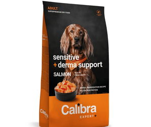 A bag of Calibra Expert+ dog food, 'Sensitive + derma support' salmon recipe, featuring a brown long-haired dog on a black and orange background.