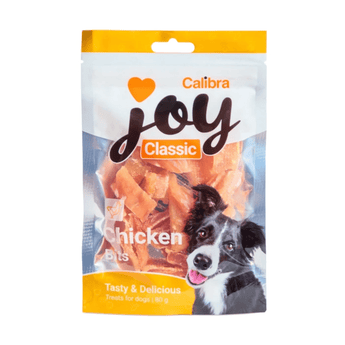 A package of Calibra Joy Classic Chicken Bits dog treats, featuring a white and orange stand-up pouch with a picture of a black and white dog on the front.