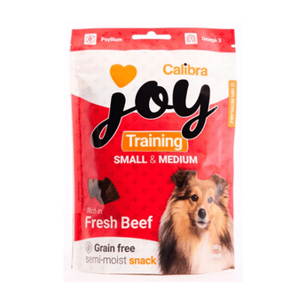 A bag of Calibra Joy Training Small & Medium dog treats, featuring a red and white package with a picture of a Sheltie dog and beef flavour text.