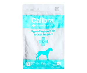 A 2 kg bag of Calibra Veterinary Care Hypoallergenic Skin & Coat Support dog food, featuring a white and teal design with a dog silhouette.