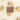 Close up of a cream cat bed with brown pawprints with a central brown tag which says 'Danish Design'.