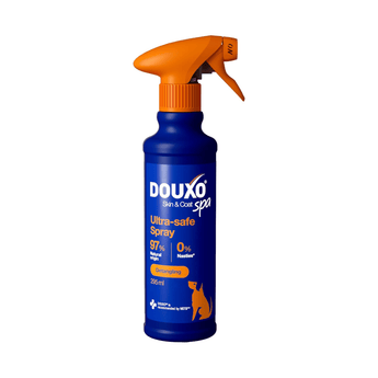 White background with a blue bottle of Douxo Ultra-safe Detangling Spray with an orange spray pump.