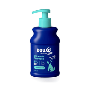 White background with a blue bottle of Douxo Ultra-safe Odour Control Shampoo with aqua blue pump.