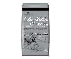 White background with a grey bag of Dr.John Titanium Chicken and Vegetables dry food. Pictured on the bag is an illustrated Labrador dog in a farm field.