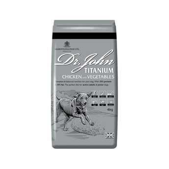 White background with a grey bag of Dr.John Titanium Chicken and Vegetables dry food. Pictured on the bag is an illustrated Labrador dog in a farm field.