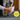 Close up of a dog's foot being cleaned with an Earth Rated grooming wipe with a yellow circle with green text stating 'Essential after walks, hikes, or in between baths'.