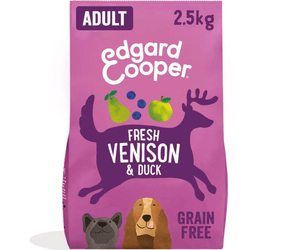 White background with a purple bag of Edgard & Cooper Adult Dog Dry Food Venison and Duck pictured. On the packet is an illustrated French Bulldog and Cocker Spaniel. Text on the pack reads, 'Edgard & Cooper.' A silhouette of a deer has text inside 'Fresh Venison & Duck' and 'Grain Free' below.