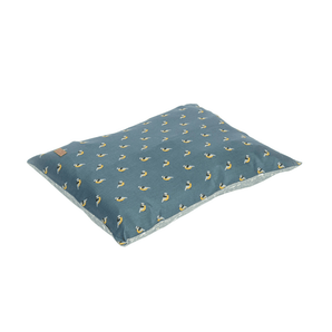 Pillow-type grey dog bed with illustrated birds and a patterned underside pictured on a white background.