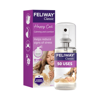 Feliway Classic Happy Cat calming spray bottle and packaging box, featuring purple and white branding with a photo of a woman holding a cat on the box.