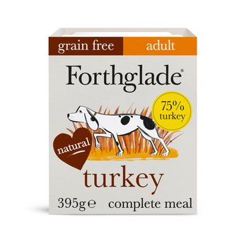 A box of Forthglade adult grain-free turkey dog food, 395g, featuring a white box with brown, orange, and yellow accents, and an illustration of a black and white dog.