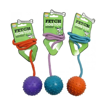 White background with 3 Good Boy rubber ball with rope dog toys, one purple, one blue and one orange.