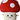 White background with a close up of a large Happy Pet mushroom dog toy with a stitched smiley face and red and white cap.