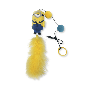 A plush Minion cat teaser with a yellow feather tail, featuring a yellow and blue Minion character, two pom-poms, and a black cord with a yellow ring on a white background.