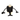 White background with a black and grey Happy Pet Minions Gru dog toy with tug ropes for the scarf on the character.