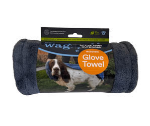 Grey microfibre glove towel rolled up in a cardboard sleeve with text 'Henry Wag, Active Paws Outdoors, Microfibre Glove Towel' with a picture of a Springer Spaniel being dried with the glove towel. Pictured on a white background.