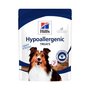 Hills Hypoallergenic dog treats packaged in a white bag with an adult brown and white collie dog pictured on the bag. Text on bag say 'Hill's, Hypoallergenic Treats' on white background.