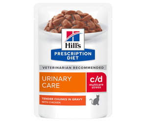 Hills Prescription cat food pouch with a bowl full of food pictured on the packet, text reads 'Urinary Care, C/D Multicare Stress' and 'Tender chunks in Gravy with Chicken' on a white background.