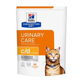 Hills Prescription Diet C/D Urinary Care dry cat food packaged in a white bag with an adult ginger tabby cat pictured on the bag. Text on bag says 'Hill's Prescription Diet, Urinary Care' and 'C/D Multicare, Veterinarian recommended' pictured on white background.