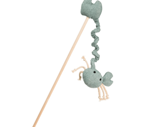 A House of Paws plush crab dog toy on a wooden stick, featuring a dusty sage green fabric body and cream-colored rope tentacles, shown against a plain white background.