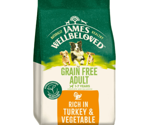 White background with a bag of James Wellbeloved Grain Free Turkey & Vegetable Dog Food. Packaging is green and cream with 3 dogs pictured, with text 'Grain Free Adult, Dog 1-7 years, Rich in Turkey and Vegetables'.