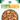 Green bowl with James Wellbeloved Grain Free Lamb and Chicken wet dog food pictured inside.