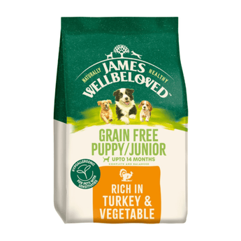 White background with a bag of James Wellbeloved Grain Free Turkey & Vegetable Puppy/Junior Food. Packaging is green and cream with 3 dogs pictured, with text 'Grain Free Puppy/Junior , Upto 14 months, Rich in Turkey and Vegetables'.