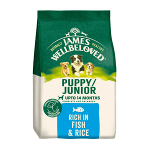 White background with a bag of James Wellbeloved Fish & Rice Puppy/Junior Food. Packaging is green and cream with 3 puppies pictured, with text 'Puppy/Junior ,Upto 14 months, Rich in Fish & Rice'.