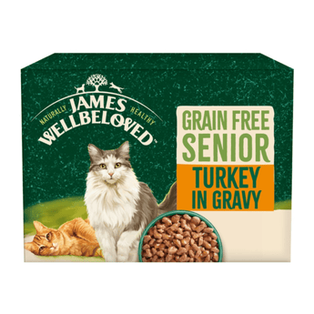 White background with a box of James Wellbeloved Turkey Senior Wet Food. The tin is green and cream with 2 cats pictured, with text 'Grain Free Senior, Turkey in Gravy.