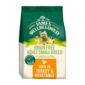 White background with a bag of James Wellbeloved Grain Free Turkey & Vegetable Small Adult Dog Food. Packaging is green and cream with 3 dogs pictured, with text 'Grain Free Adult Small Breed, 6 months - 10 years, Rich in Turkey and Vegetables'.