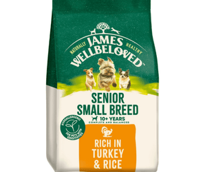 White background with a bag of James Wellbeloved Turkey & Rice Senior Small Dog Food. Packaging is green and cream with 3 dogs pictured, with text 'Senior Small Breed, 10+ years, Rich in Turkey and Rice'.